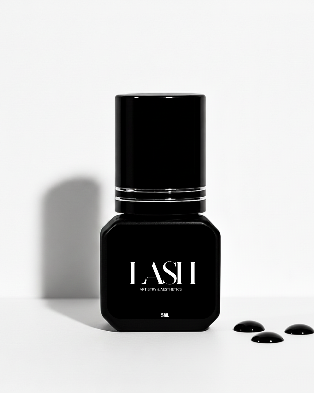 Black bottle labeled 'LASH' with three black capsules on a white background