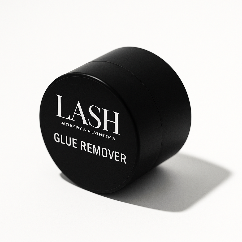 Black container of LASH Artistry & Aesthetics Glue Remover on a white background
