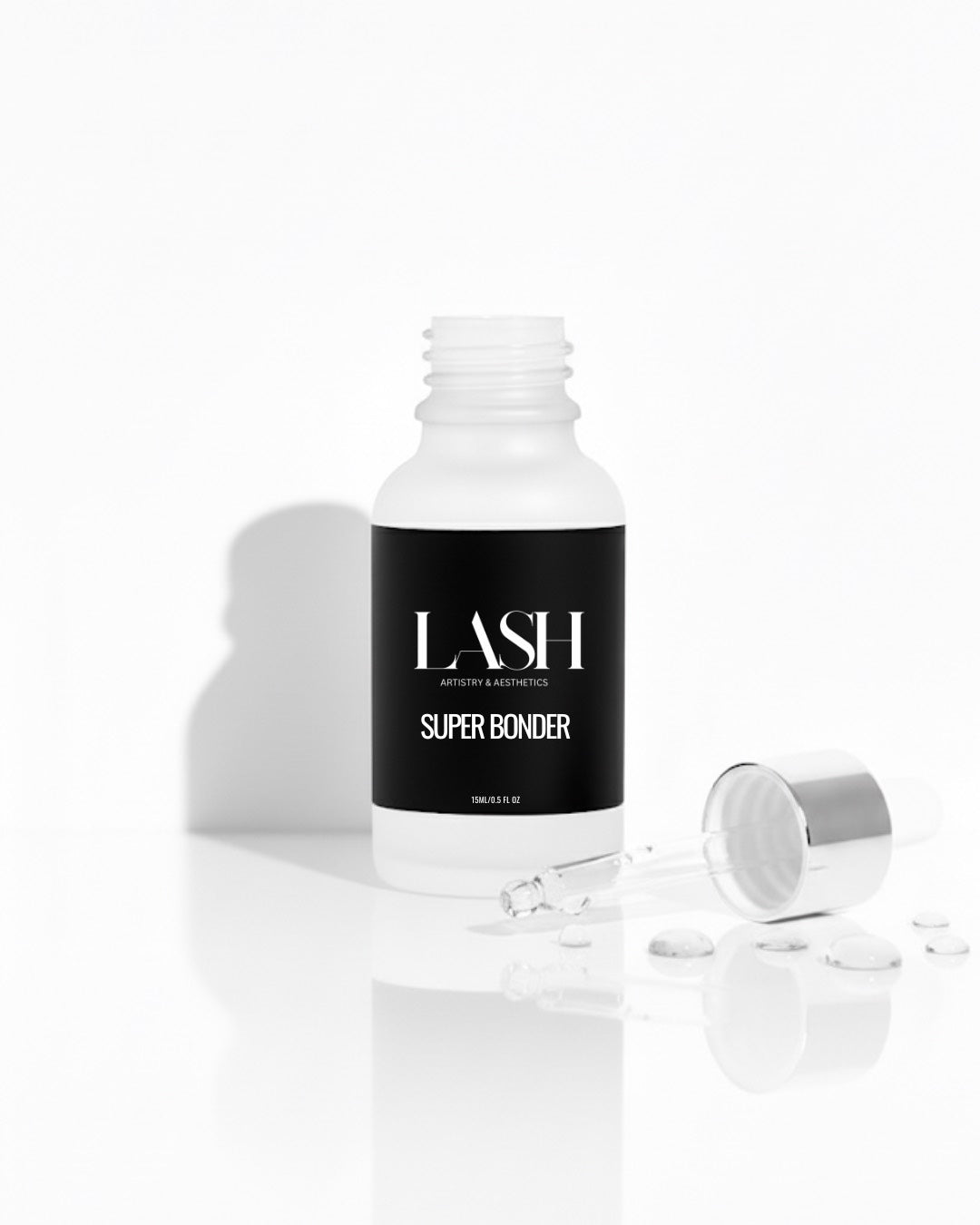 White bottle labeled 'LASH SUPER BONDER' on a white background