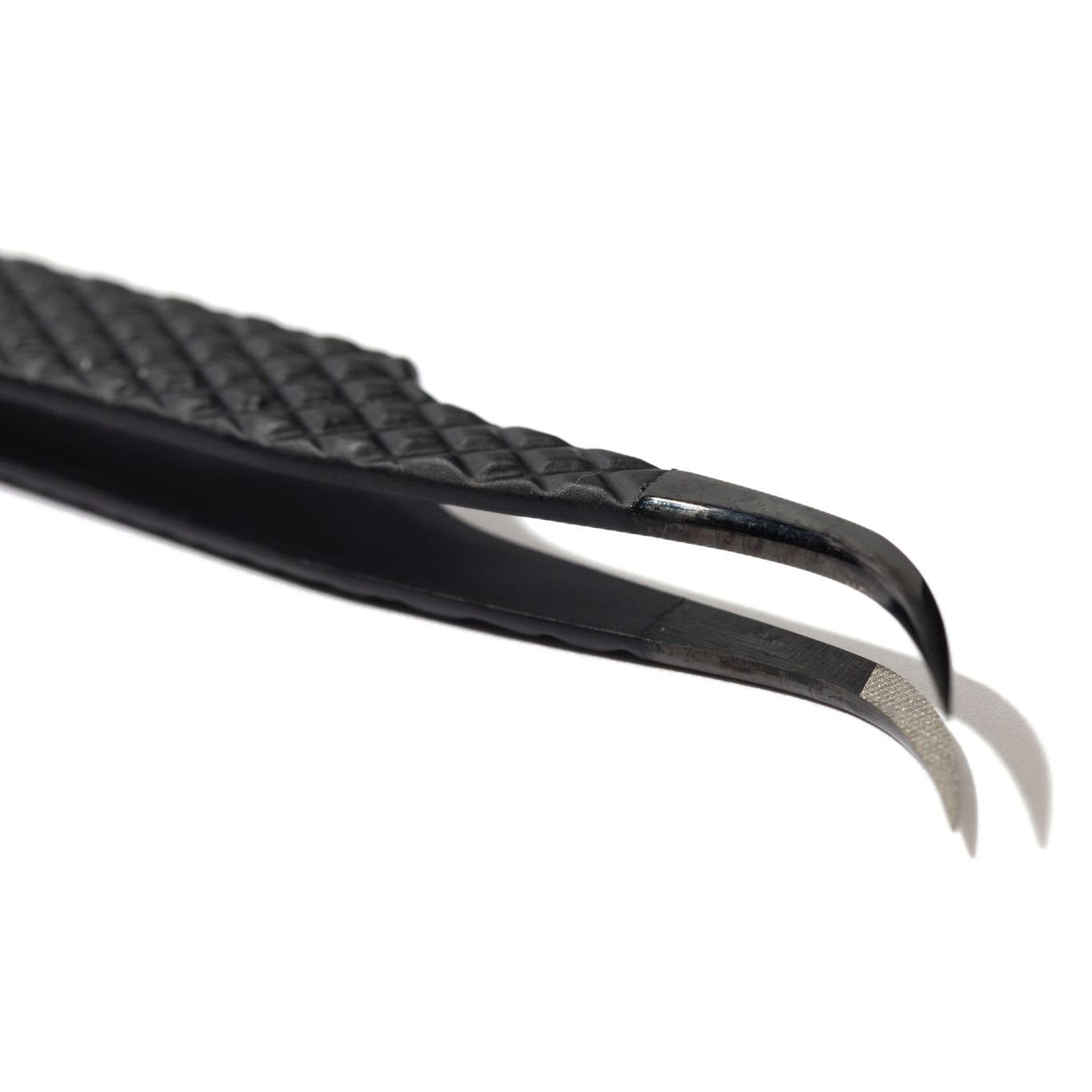 Close up detail of black tweezers