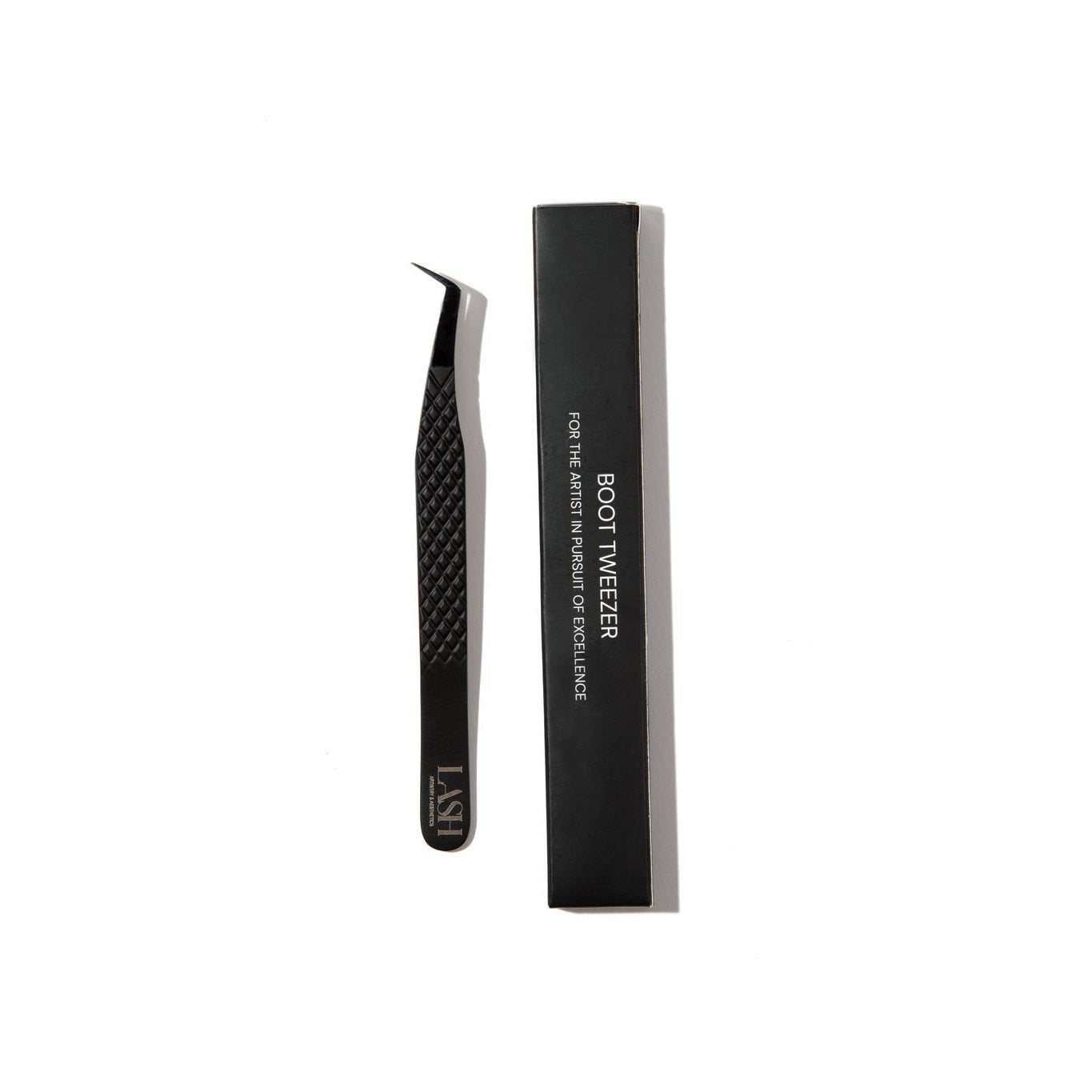 A black fiber tip boot tweezer alongside its packaging, designed for creating spikes and narrow fans in beauty treatments.