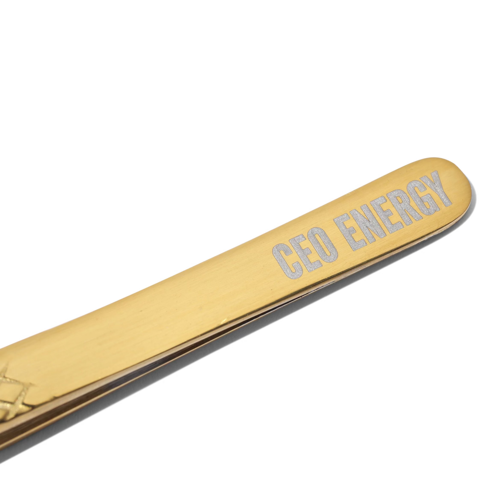 Close up detail of the end of the tweezers with CEO Energy stamped on the handle