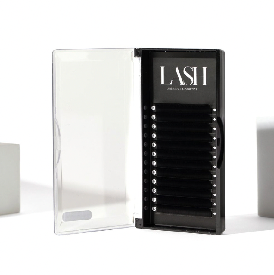 A pack of false eyelashes displayed in a clear case with the brand name 'LASH' visible on the front.