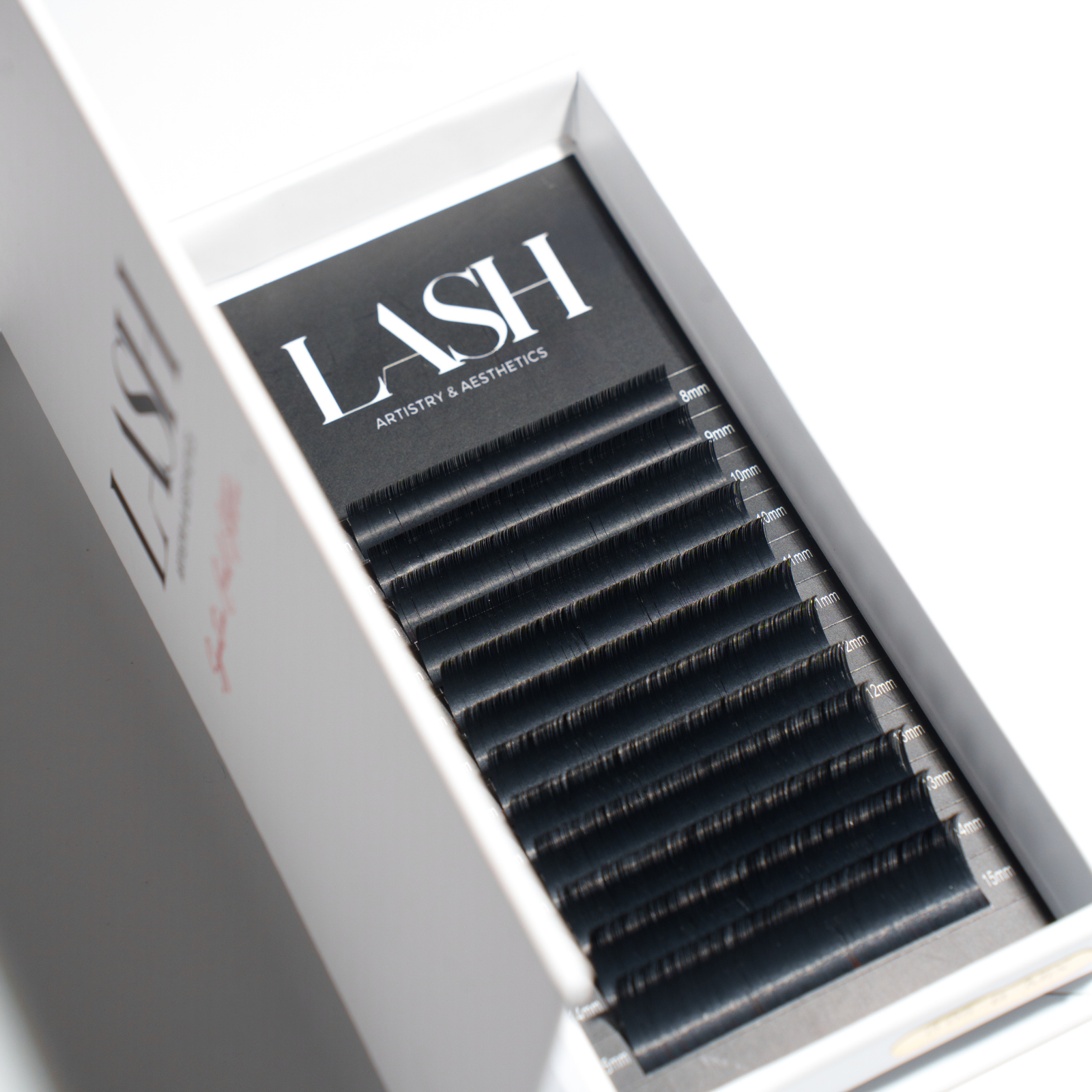 Eyelash extension tray with 'LASH' branding on a white background