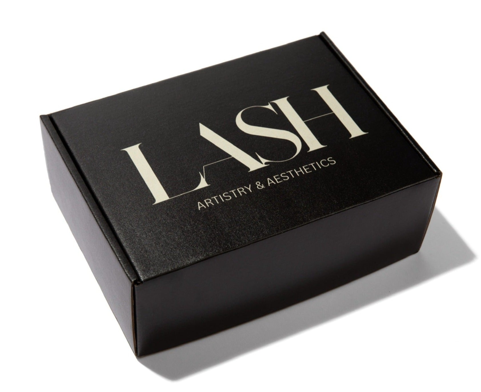 Black box with LASH artistry & Aesthetics on top